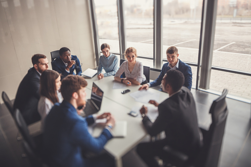 Financial advisors in conference room