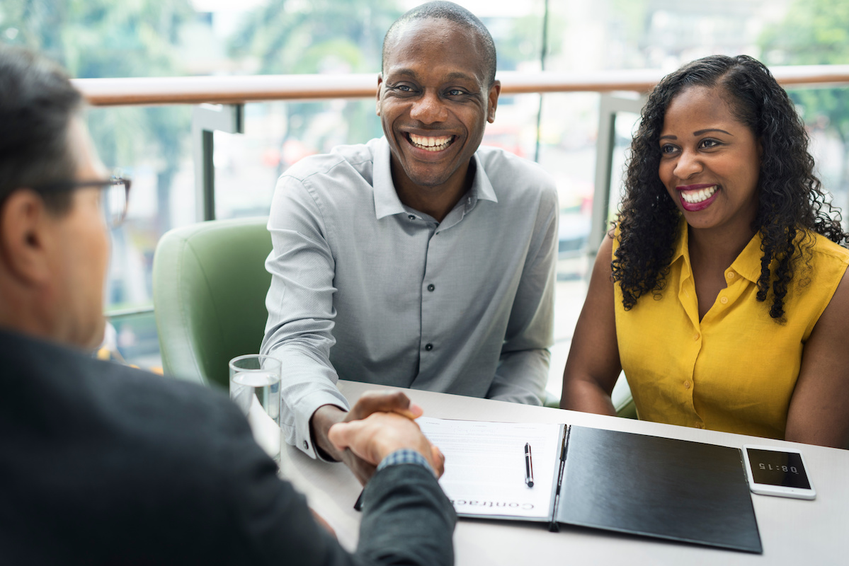 Couple discussing their comprehensive retirement plan with their financial advisor in Buffalo Grove, IL