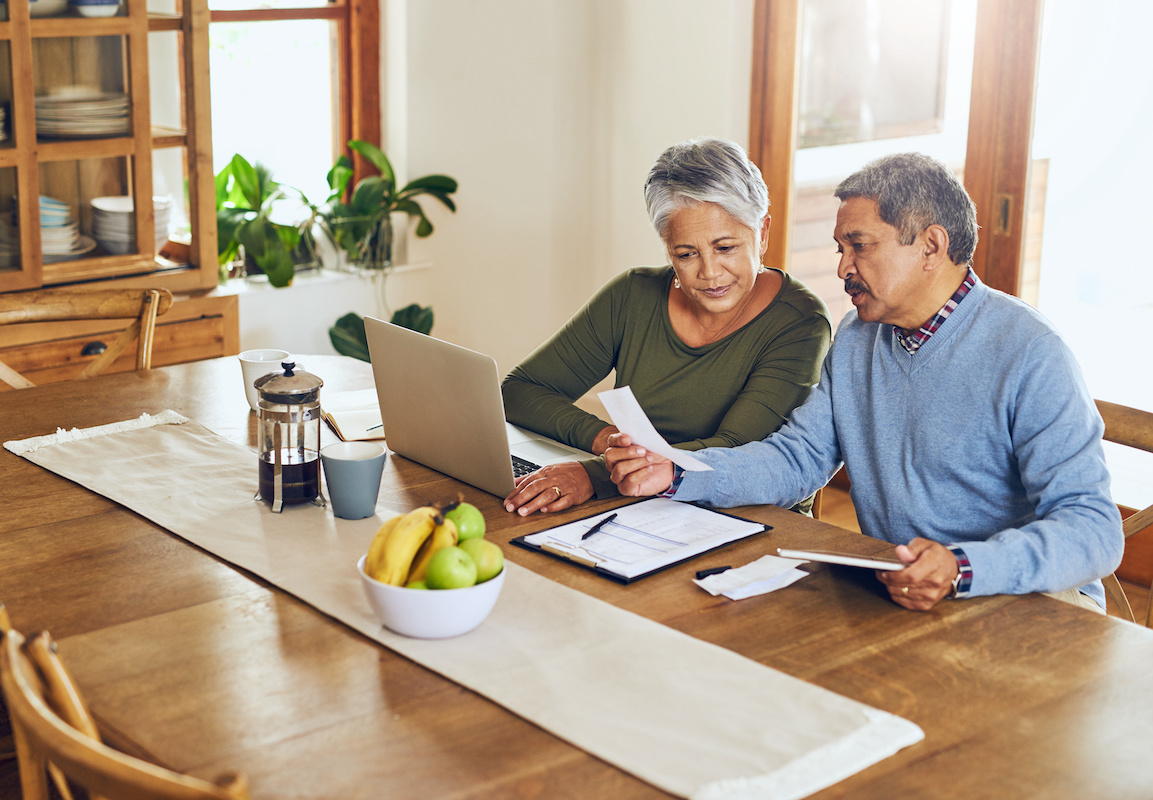 Couple going over their tax planning and investment strategies